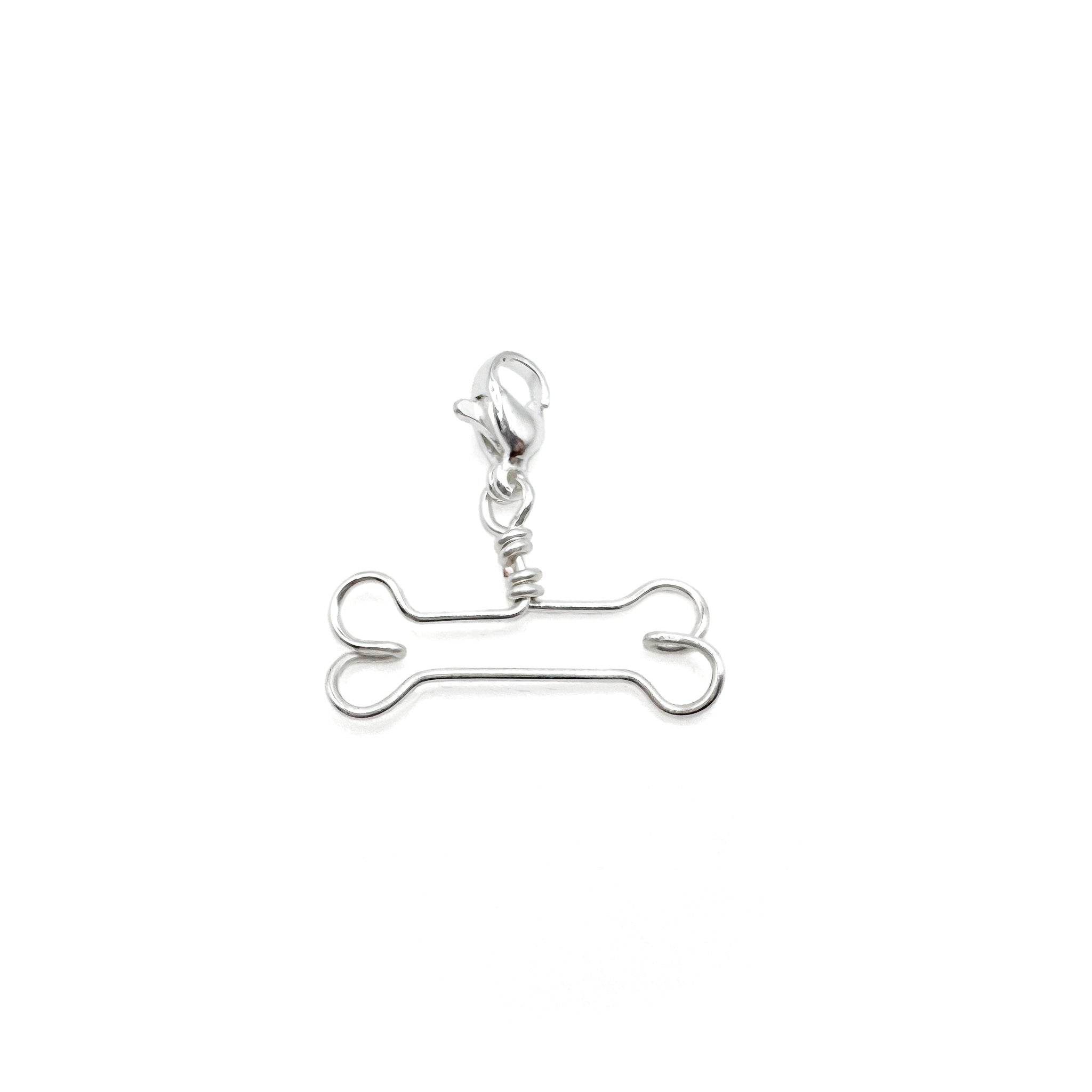 Bone silver charm